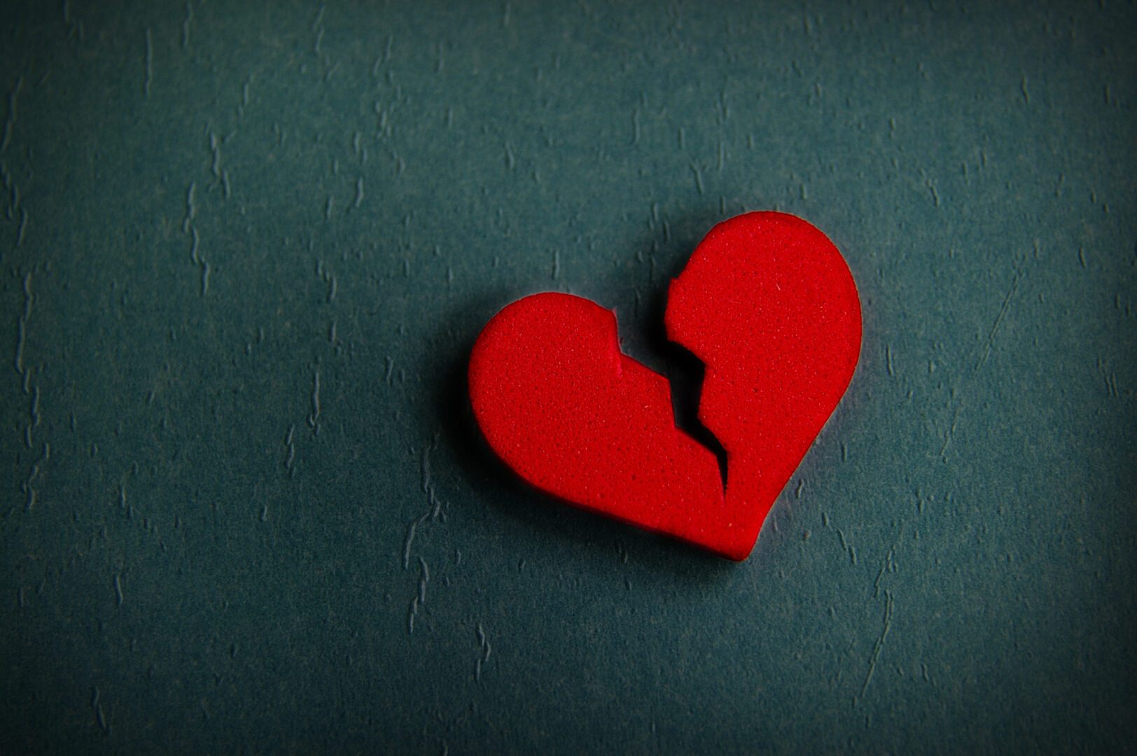 A red heart with a broken one on it.