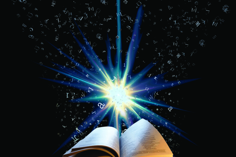 A book with the light shining from it.