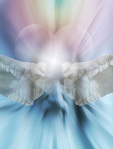 A white angel with wings spread out and a light blue background