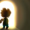 A toy doll is standing in front of the light.