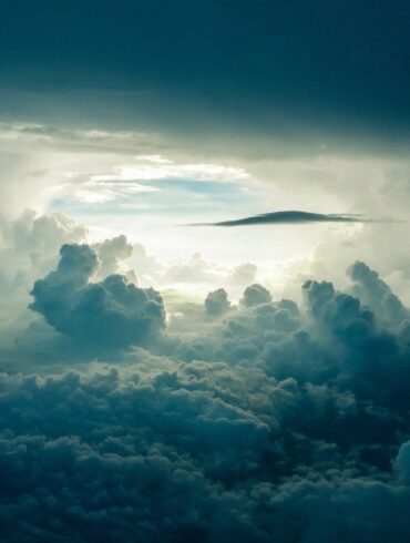A cloud formation with the sun shining through.