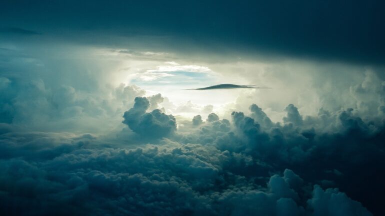 A cloud formation with the sun shining through.