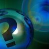 A question mark on a ball and some other balls