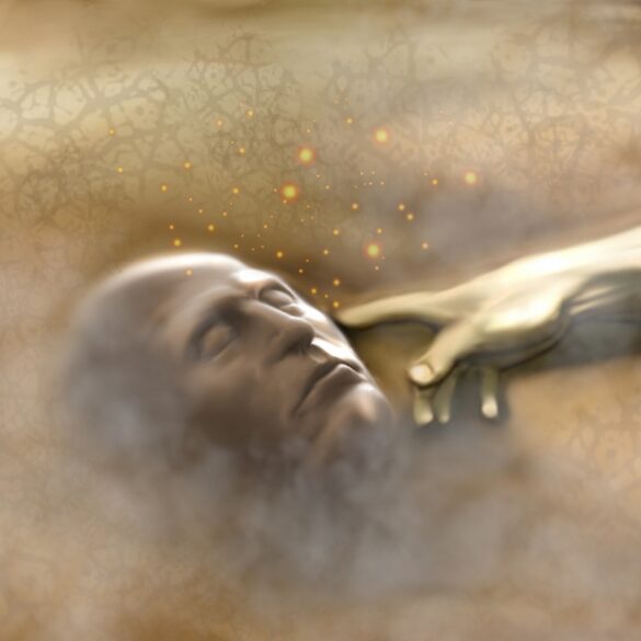 A man laying in the sand with his hand extended.
